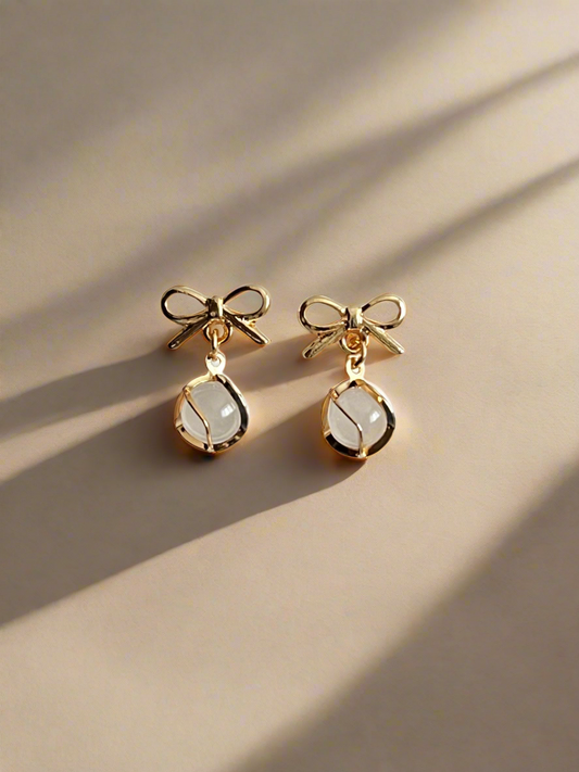 Bow and pearl - drop earrings